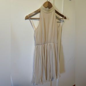 Off white pleaded halter dress with pearl neckline